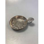 A French metalwares silver tastevin by Christofle/Cardeilhac, marked CARDEILHAC, the base set with a