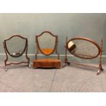 A George III style mahogany dressing table swing mirror with serpentine base 62 x 46 x 20cm together