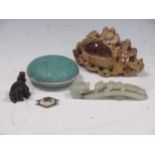 A Chinese mutton fat jade belt hook, late Qing Dynasty, a carved soapstone ornament, a turquoise