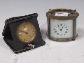 A 20th century oval shape carriage timepiece, 8 x 10 x 7cm, together with a Swiss bedside alarm