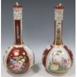 A pair of Dresden style ceramic bottle vases with covers, decorated with courting couples, blue