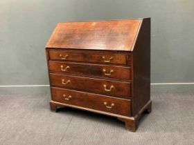 A George III oak bureau 107 x 108 x 53cm