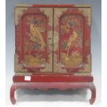 Small Japanese lacquer cabinet on stand, early 20th century, 40 x 32 x 22cm
