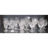 A quantity of cut glass drinking glasses including brandy rummers etc