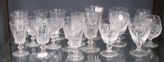 A quantity of cut glass drinking glasses including brandy rummers etc