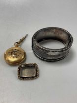 A pocket watch stamped '18K' weight 33.2g, together with a Georgian brooch and a Victorian silver