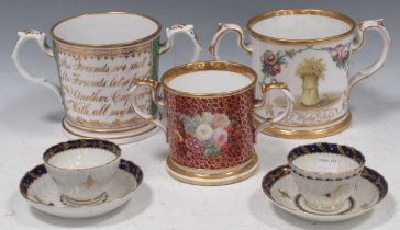 Three mid 19th century English loving cups and a pair of porcelain tea bowls, etc General rubbing to