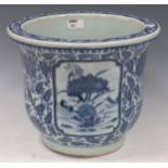 A blue and white porcelain transfer printed jardiniere, 27cm high x 32cm diameter Scratches,