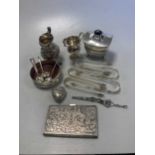 A collection of silverware including sugar nips, tea caddy, cram jugs, bottle coaster etc together