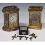 A French oval carriage clock (glass cracked) 12 x 11 x 8cm and another 11.5 x 8 x 6cm (2)