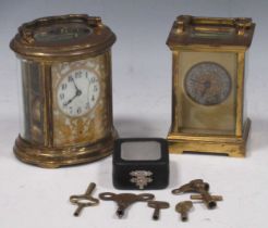 A French oval carriage clock (glass cracked) 12 x 11 x 8cm and another 11.5 x 8 x 6cm (2)