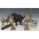 A carved model of a water buffalo and a pair of horse hames, a pair of dog fire flat ornaments etc