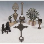 A set of six Burmese bronze chicken 'opium' weights; an Ethiopian silver plated open fretwork cross;