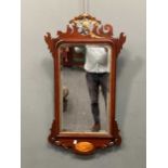 A George III style mahogany fret cut wall mirror with gilt bird cresting 91 x 49cm