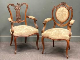 Two Edwardian upright carved frame open armchairs