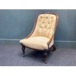 A Victorian upholstered low easy chair