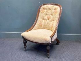 A Victorian upholstered low easy chair