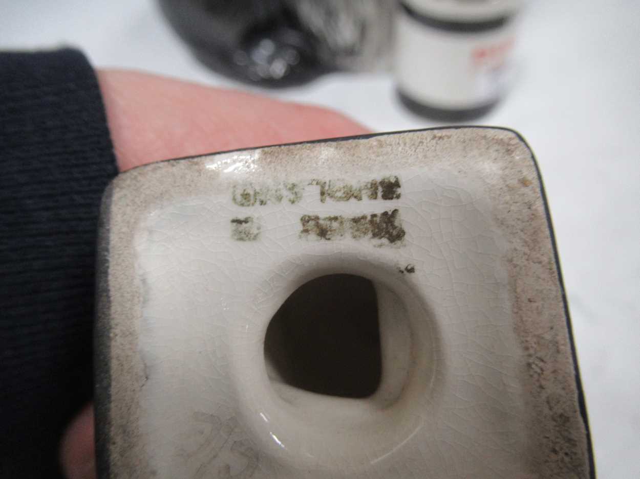 A Beswick Dulux advertising Old English Sheepdog with paint tin