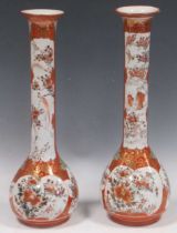 A pair of orange and gilt Chinese vases, decorated with blossoms and birds, 33cm high (2) Both vases