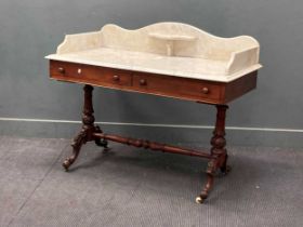 A Victorian mahogany two drawer washstand with white marble three-quarter gallery top 98 x 122 x