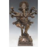 A bronze multi-armed Ganesh holding weapons, on a lotus dais base with a mouse, 52.5 x 32 x 20cm