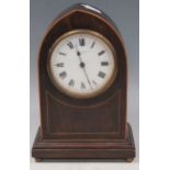 An Irish (Belfast) retailed arch top mantel clock, early 20th century, and an Edwardian mahogany