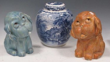 A pair of Sylvac coloured dog models, 24cm high, with a blue and white ginger jar decorated with a