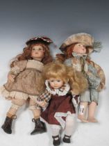 Three bisque head dolls, including one named Hannah