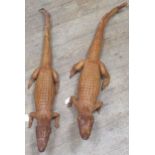 A pair of taxidermy caymans, 106cm long