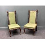 A pair of Edwardian bedroom chairs, the rectangular backs with barley twist supports on cabriole