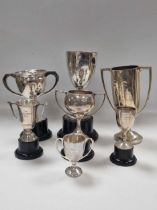 A collection of 7 silver sporting trophies, 5 with attached plinths, estimated weight 50ozt (7)