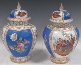 A pair of Dresden lidded vases (one neck broken), early 20th century, typical figural painted