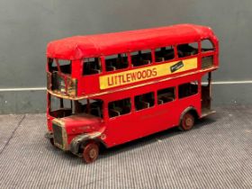 A model London bus with sheet metal tin roof, fibre board sides, plywood seats on Mecano metal frame