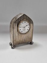 A silver mounted early 20th century dressing table clock