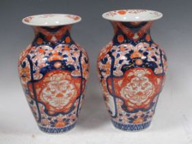 A pair of imari vases, 30cm high