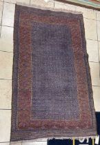 A blue ground sumac rug, with reg ground geometric pattern, 228 x 140cm