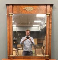 A mahogany and brass Empire style wall mirror, 19th century