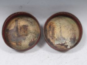 A pair of toleware coasters, possibly decorated with Great Yarmouth scenes