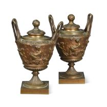 A pair of bronze urns and covers, late 19th century,