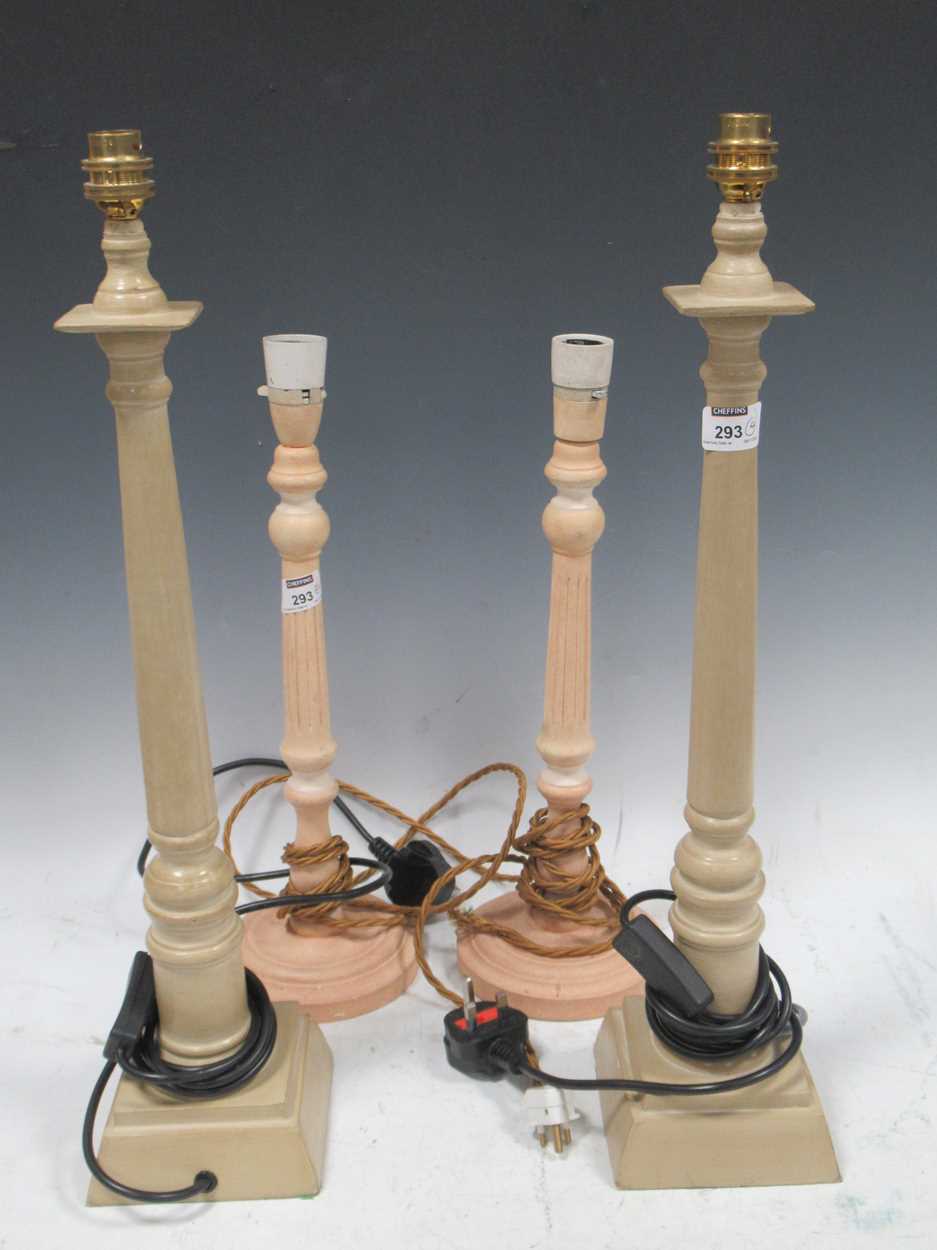 Two pairs of turned wood lamps bases Provenance: Heydon Grange, Norfolk