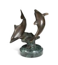 A contemporary bronze group of dolphins,