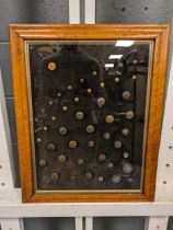 A collection of 46 framed Art Nouveau buttons (framed), 41cm x 31cm (aperture of frame), 3cm (
