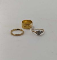 Two hallmarked 22ct gold rings, gross weight 8.1g, and a diamond set ring (A/F) stamped '18CT