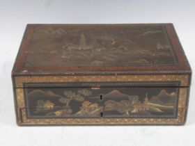 Three Chinese export black lacquered boxes and one small cabinet (4)