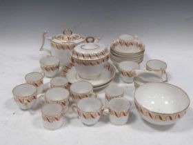 A Crown Derby tea service in gold, red and gilt, including teacups, teapot, saucers, etc