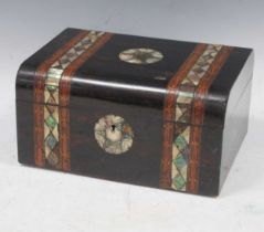 A late 19th century coromandel dome topped box, with central star inlay flanked by two bands of