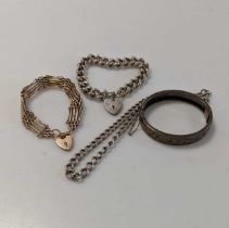 A hallmarked 9ct gold gate style bracelet weight , together with a silver bangle, chain and bracelet
