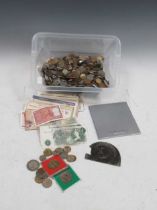 A quantity of mid 20th century British and world banknotes and coins