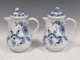 A pair of Meissen blue and white teapots, 22cm high Provenance: Heydon Grange, Norfolk