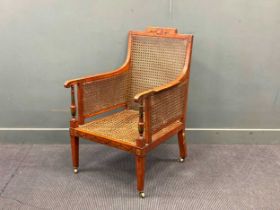 An Edwardian painted satinwood bergere armchair 102 x 63 x 68cm